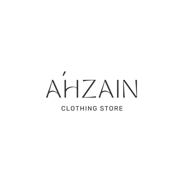 Logo of A¤hzain clothing store on a light gray background